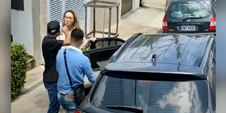 Just Let It Go: Woman Has Gun Pointed At Her Face As She Tries To Stop People From Stealing Her Car